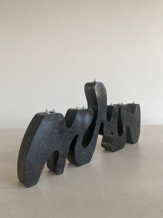 Granite Menorah Sculpture by Hannah Polskin