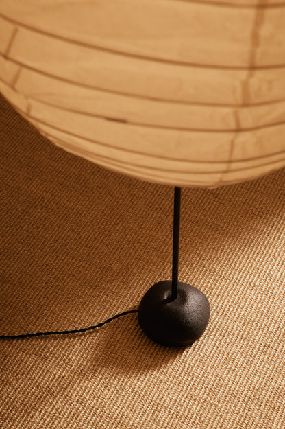 Isamu Noguchi Akari 32N floor lamp, close view of the lower shade and stem