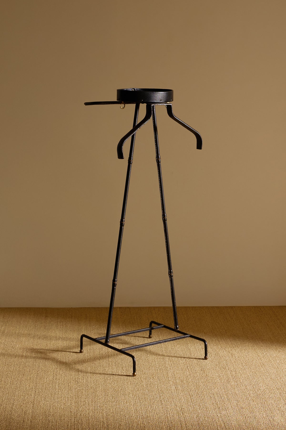 Jacques Adnet lacquered metal and leather night valet, lower front view