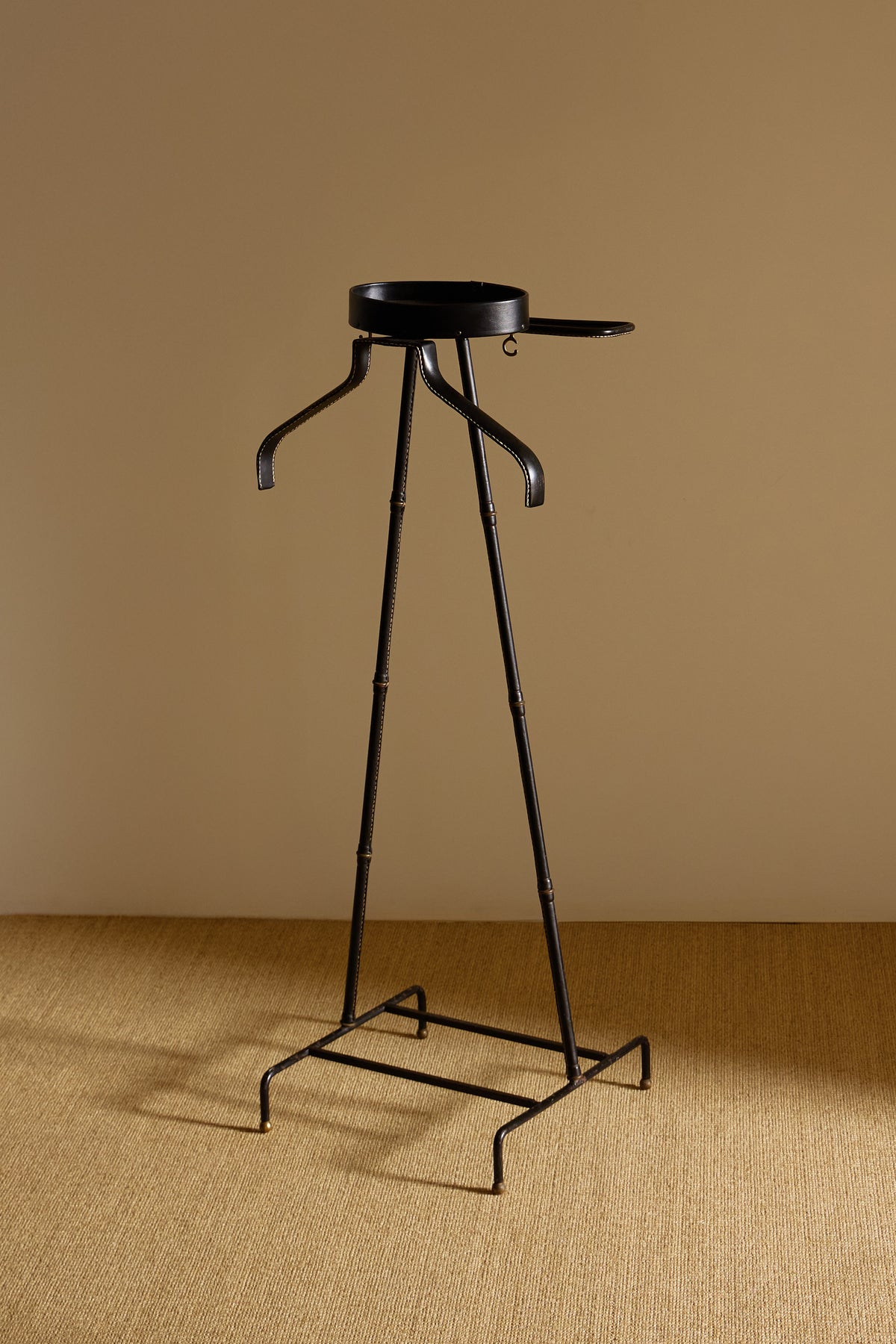 Jacques Adnet lacquered metal and leather night valet, front view