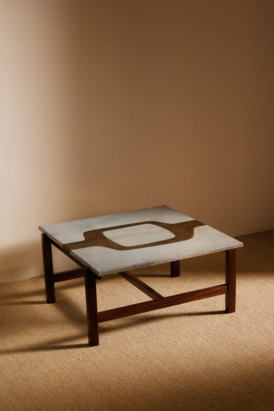 Les Deux Potiers teak wood and ceramic coffee table, angled view of the ceramic top and frame