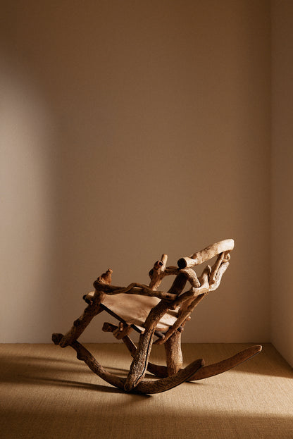 Matti Savijärvi tree root rocking chair, closer three quarter view