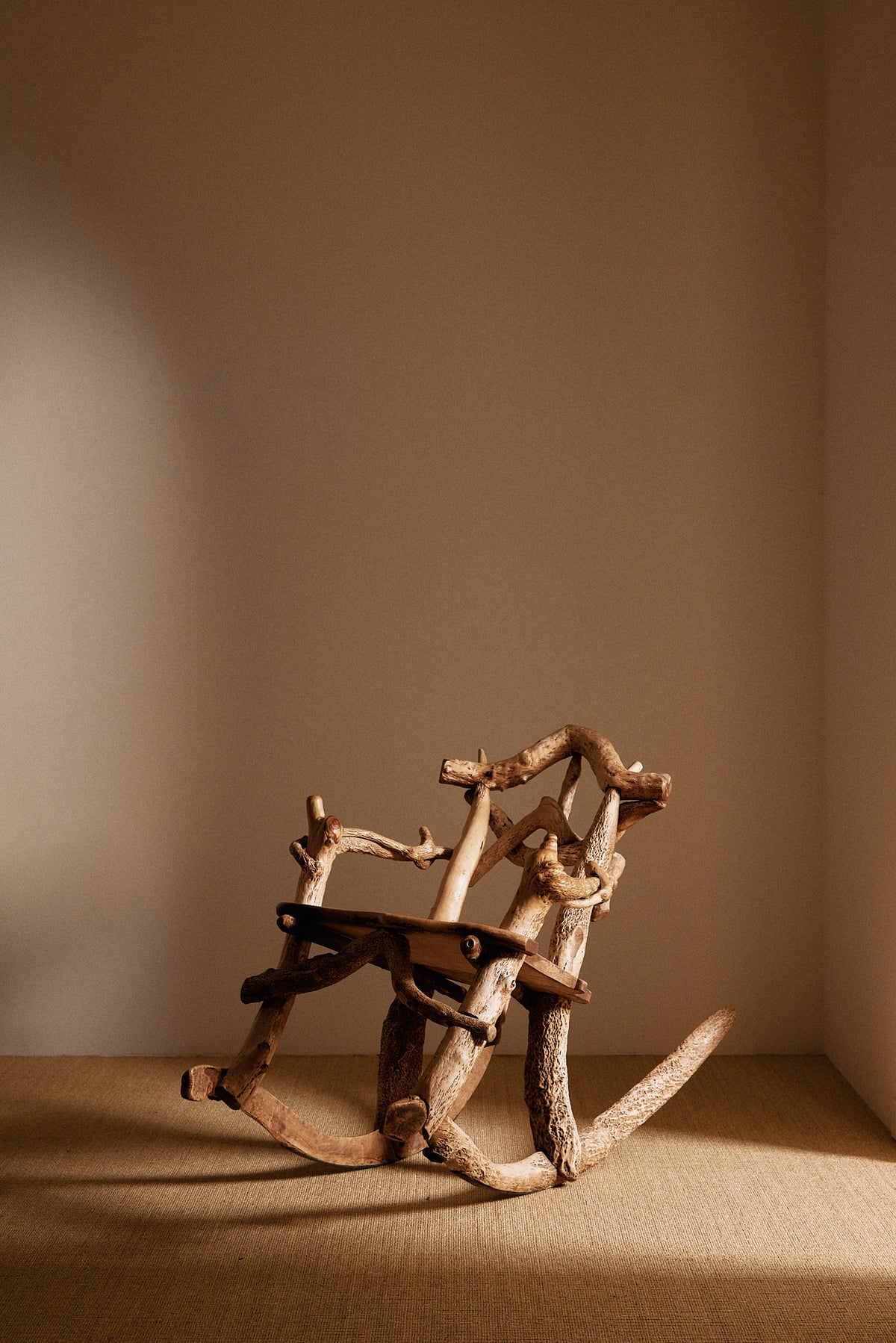 Matti Savijärvi tree root rocking chair, three quarter view
