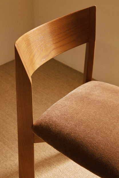 Mauro Pasquinelli oak and mohair velvet Maria dining chair, close view of the curved back rail and the cushion