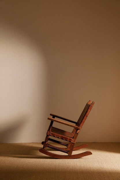 Mexican oak and tanned leather rocking chair rear angled view