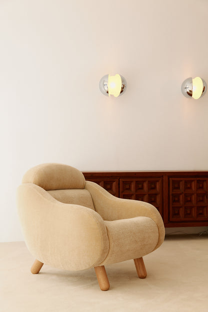 Gian Emilio, Piero & Anna Monti Diaframma polished steel and glass wall sconce, pair on the wall above an armchair and sideboard