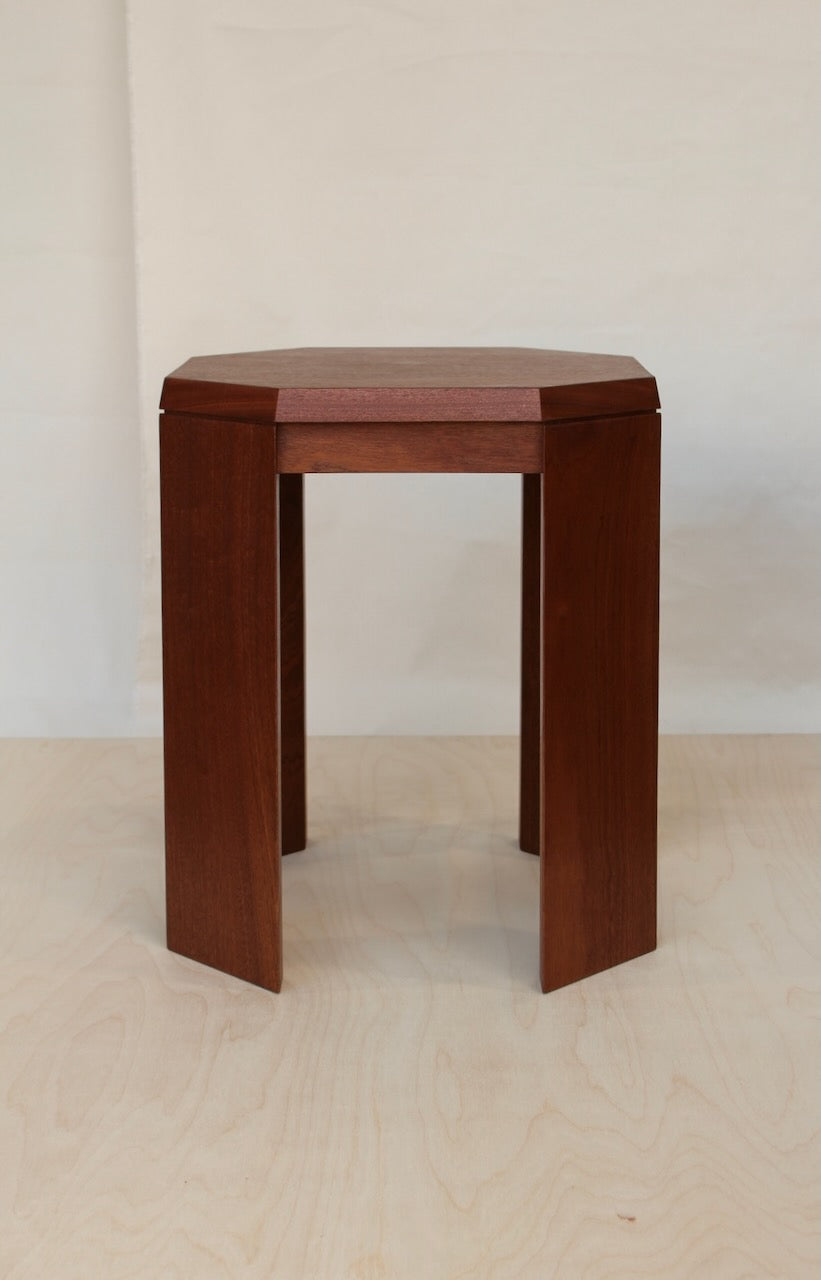 Paris Side Table in sapele mahogany, front view showing the chamfered top and two flat slab legs