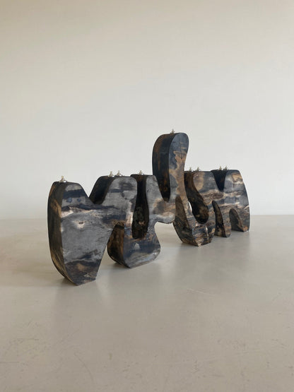 Petrified Wood Menorah Sculpture by Hannah Polskin