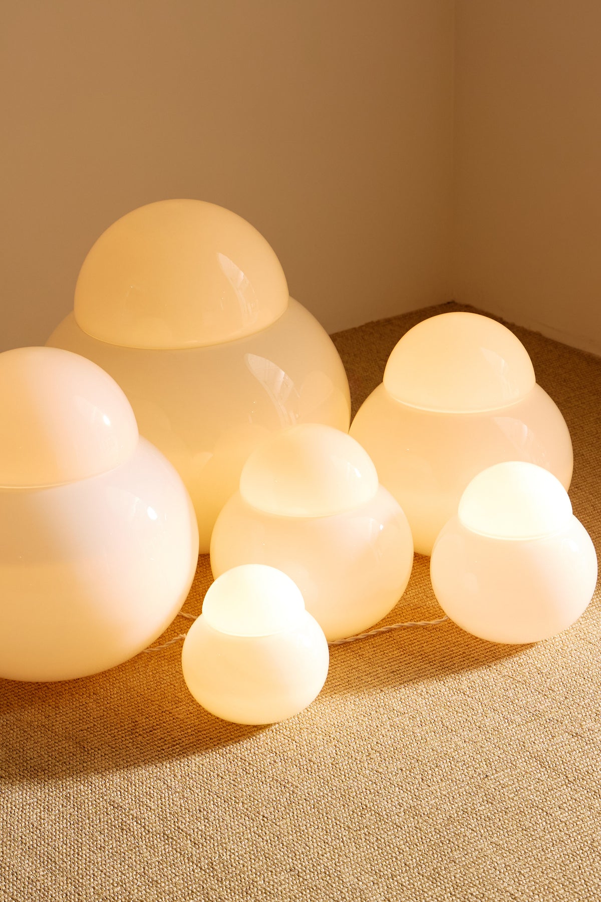 Sergio Asti frosted glass lamps, closer view of the three largest lamps