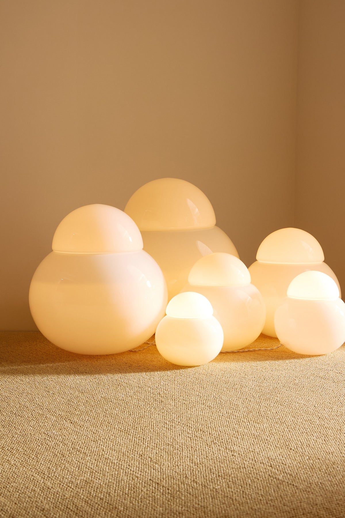 Sergio Asti frosted glass lamps, all six lamps seen from a low angle