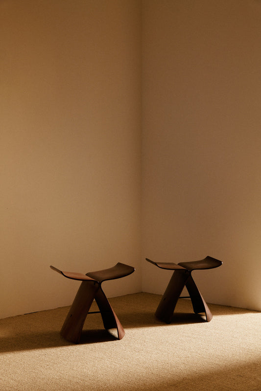 Pair of Sori Yanagi molded rosewood Butterfly stools view of the pair