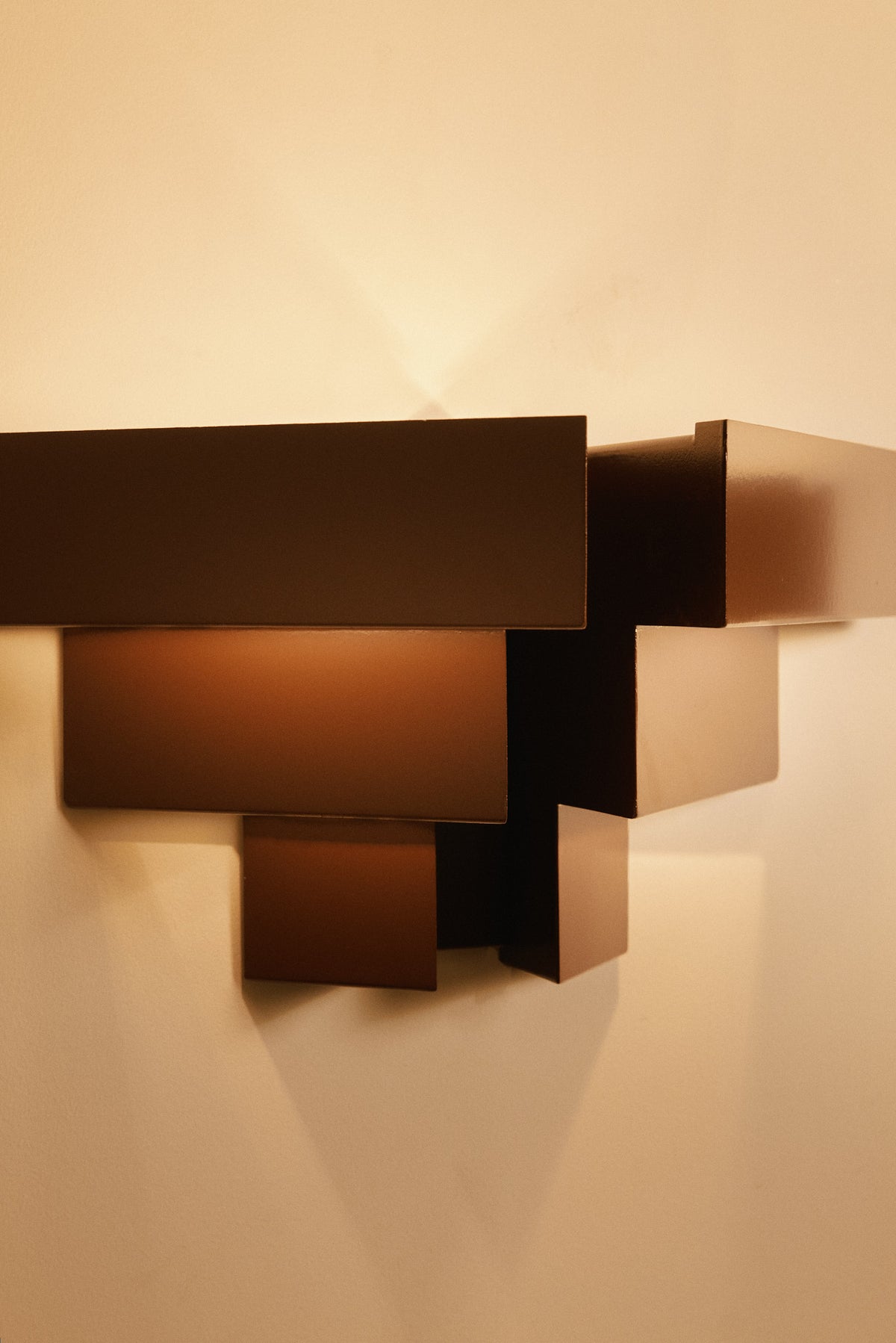 Stepped plate wall sconces, close view of the stepped plates