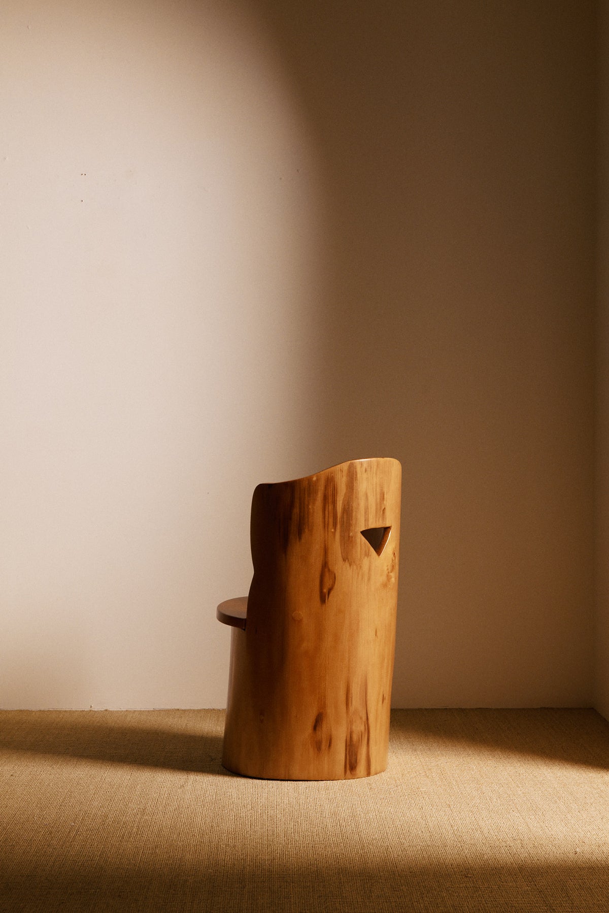 Swedish sculptural pine armchair, back angled view