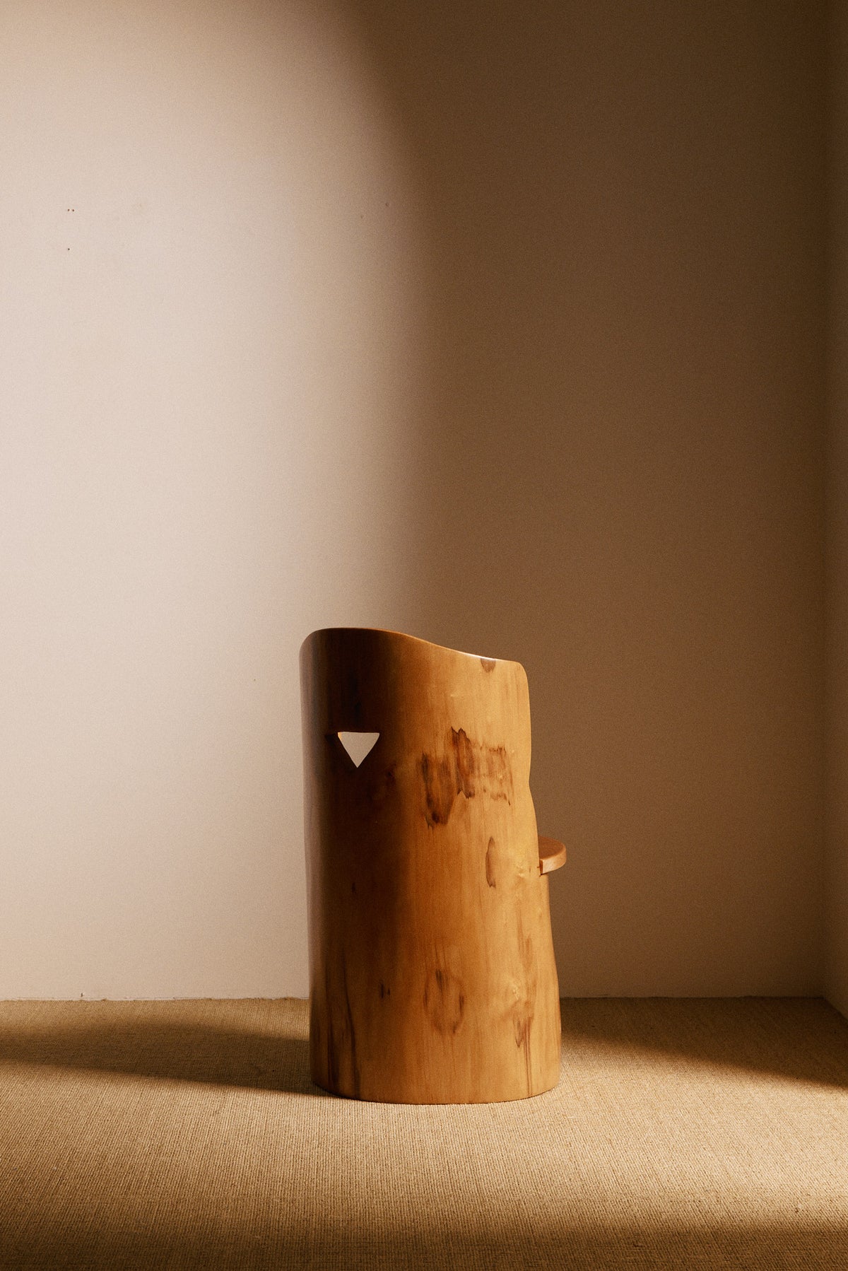 Swedish sculptural pine armchair, wide back angled view