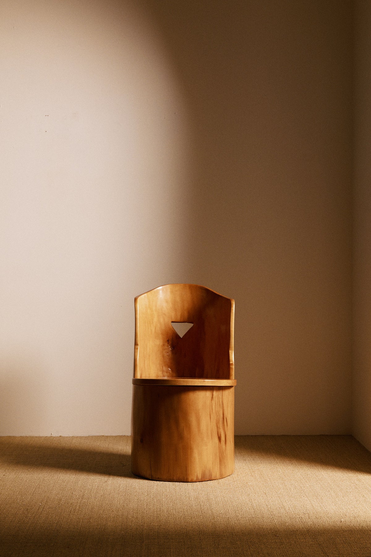 Swedish sculptural pine armchair front view
