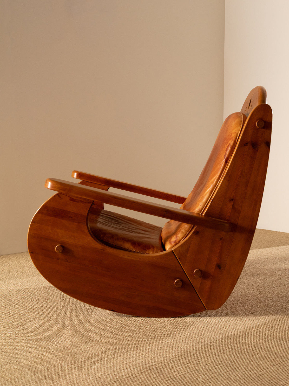 Wasa Furniture pine and patinated leather rocking chair, side view