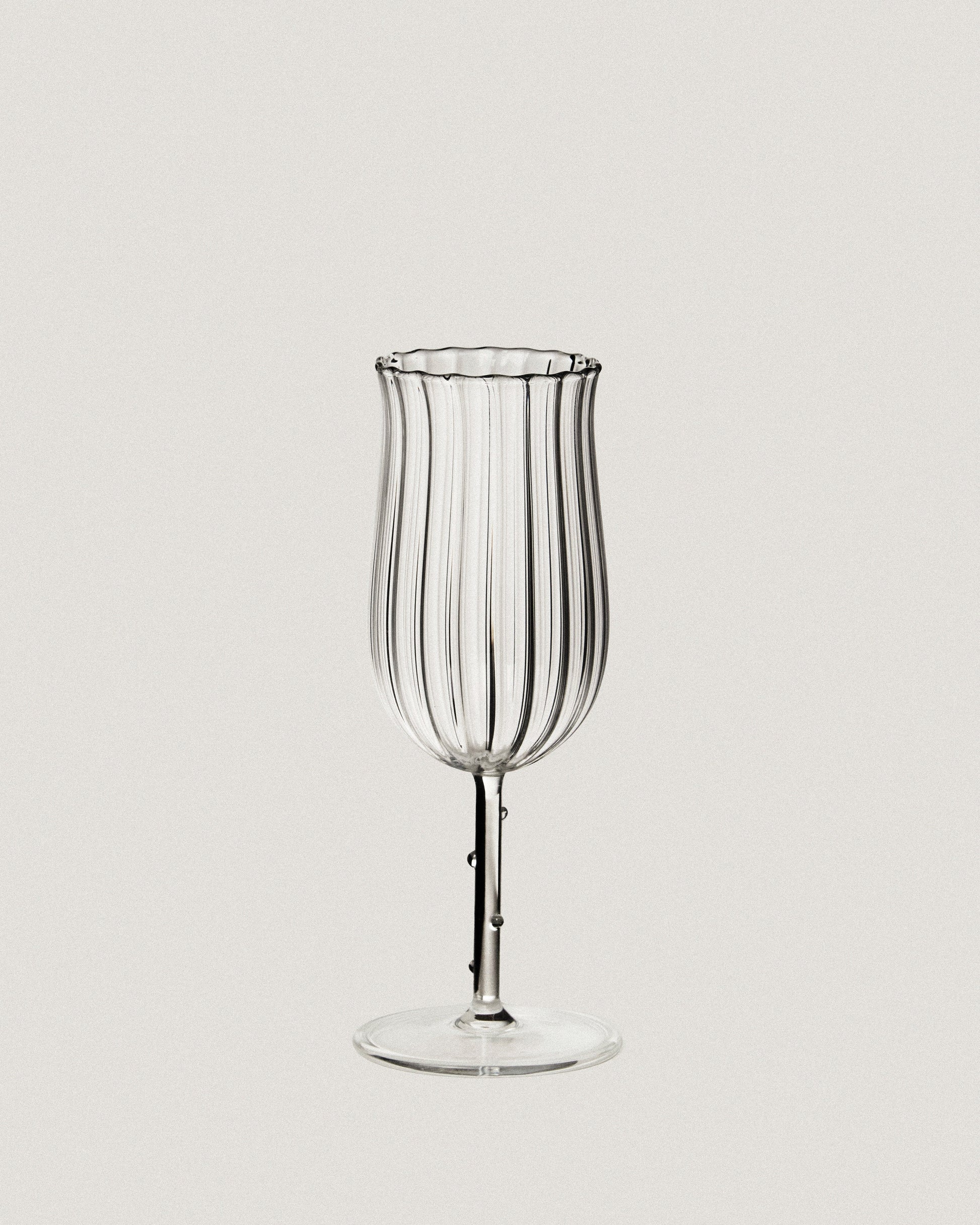 https://claudehome.com/cdn/shop/products/tulip-wine-glass.jpg?v=1700075973&width=1946